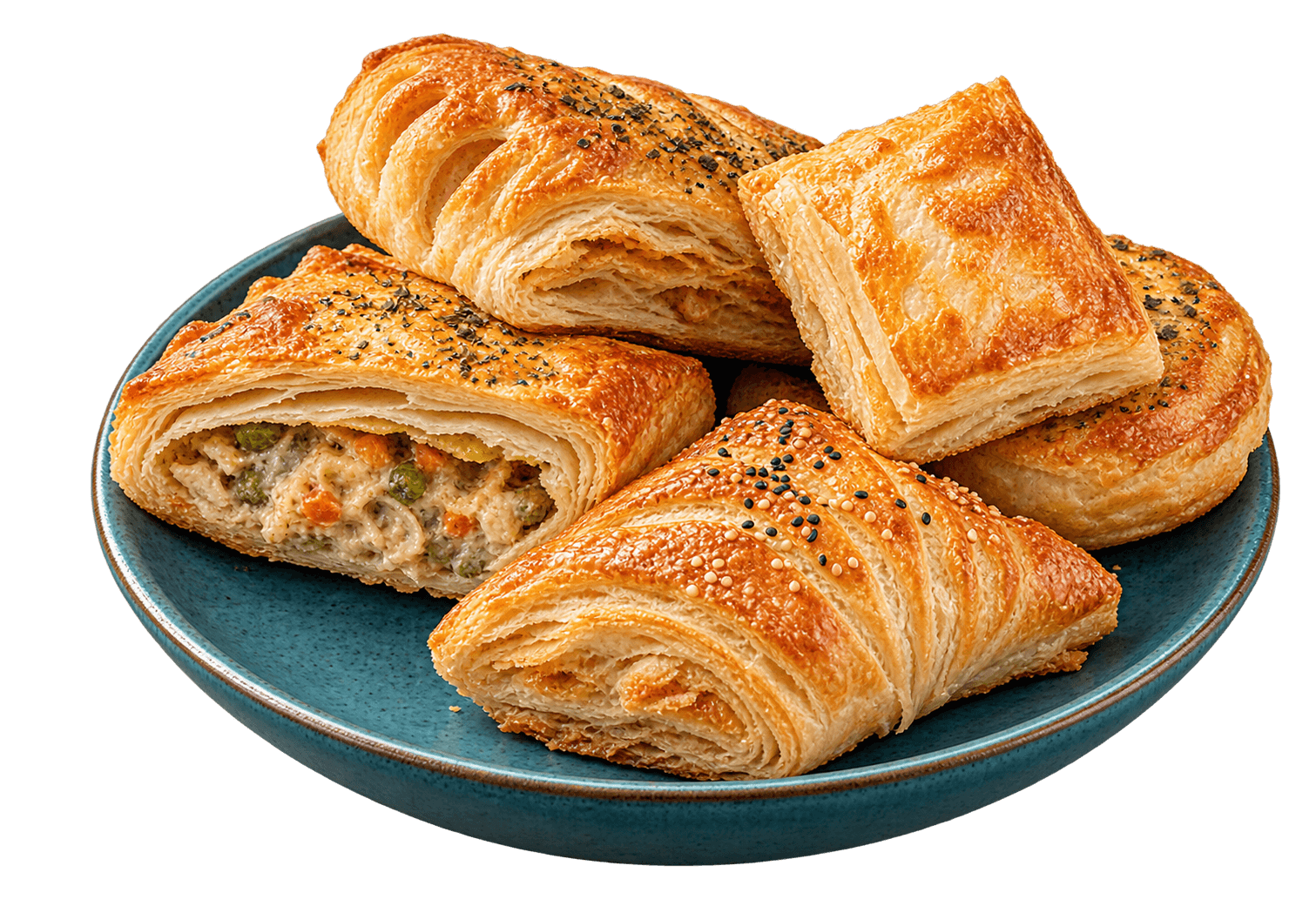 Golden puff pastries on a ceramic plate